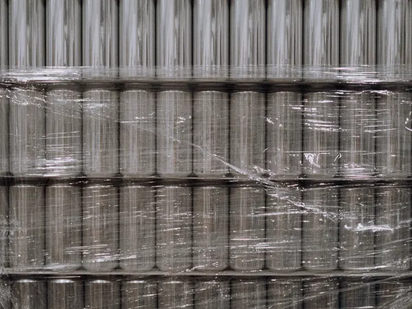 Stacked aluminum beverage cans ready for cold chain shipping